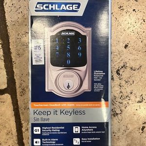 Satin nickel Schlage keyless touchscreen deadbolt with alarm.